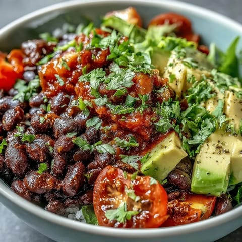 Vibrant Plant-Based Taco Bowl with black beans and fresh salsa.