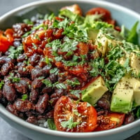 Vibrant Plant-Based Taco Bowl with black beans and fresh salsa.
